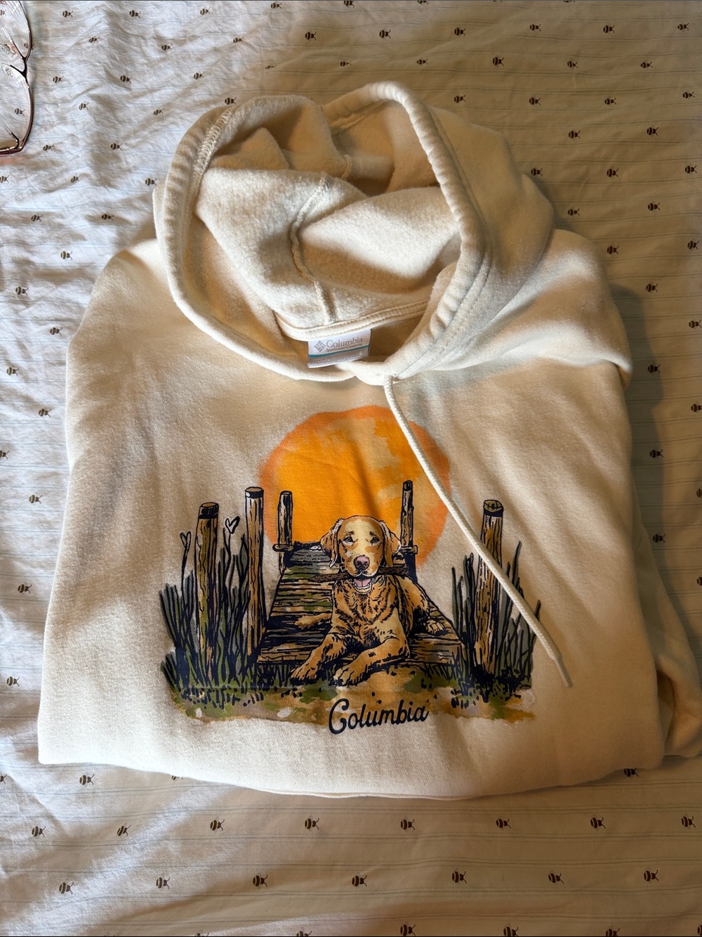 Columbia Cream Hoodie with Yellow Sun and Multicolor Dock Dog Graphic